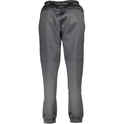 Pants by Calvin Klein for women in polyester black features a stylish silhouette with a stylish , long, and .