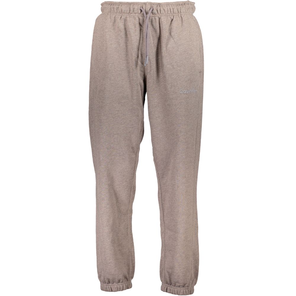 This Calvin Klein men cotton polyester Activewear in black & brown presents a contemporary silhouette from the Men's Straight-Leg Cotton Polyester Activewear collection, emphasizing high-performance adjustable-waistband for an elevated contemporary fit.