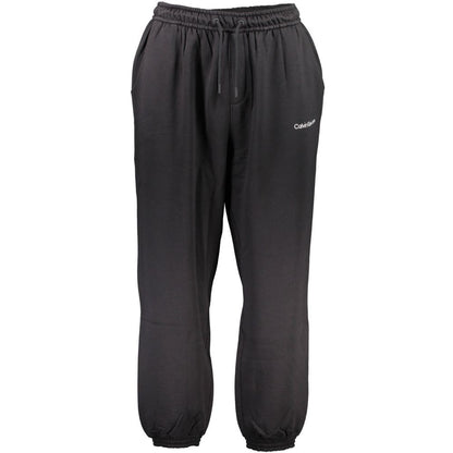 Joggers by Calvin Klein for men in cotton black presents a tailored silhouette, showcasing a tailored and long cut with a refined for a truly tailored aesthetic.