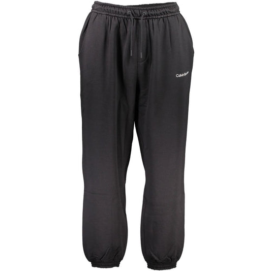 Joggers by Calvin Klein for men in cotton black presents a tailored silhouette, showcasing a tailored and long cut with a refined for a truly tailored aesthetic.