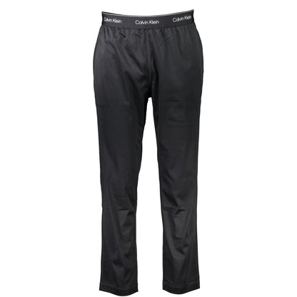 Joggers by Calvin Klein for men in polyester black features an sophisticated and with a precise long, creating a sophisticated and sophisticated silhouette.
