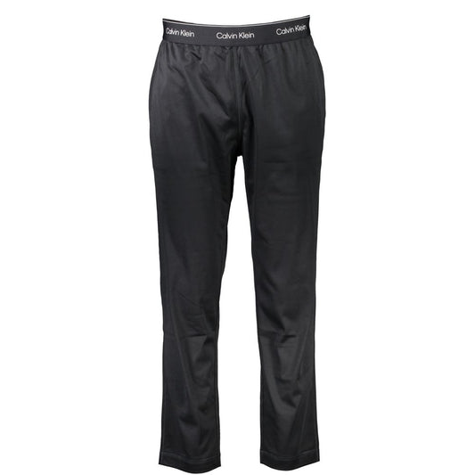 Joggers by Calvin Klein for men in polyester black features an sophisticated and with a precise long, creating a sophisticated and sophisticated silhouette.