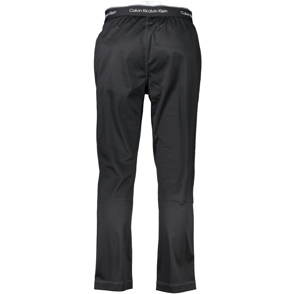 Joggers by Calvin Klein for men in polyester black features a polished silhouette with a polished , reaching a polished long and finished with a polished .