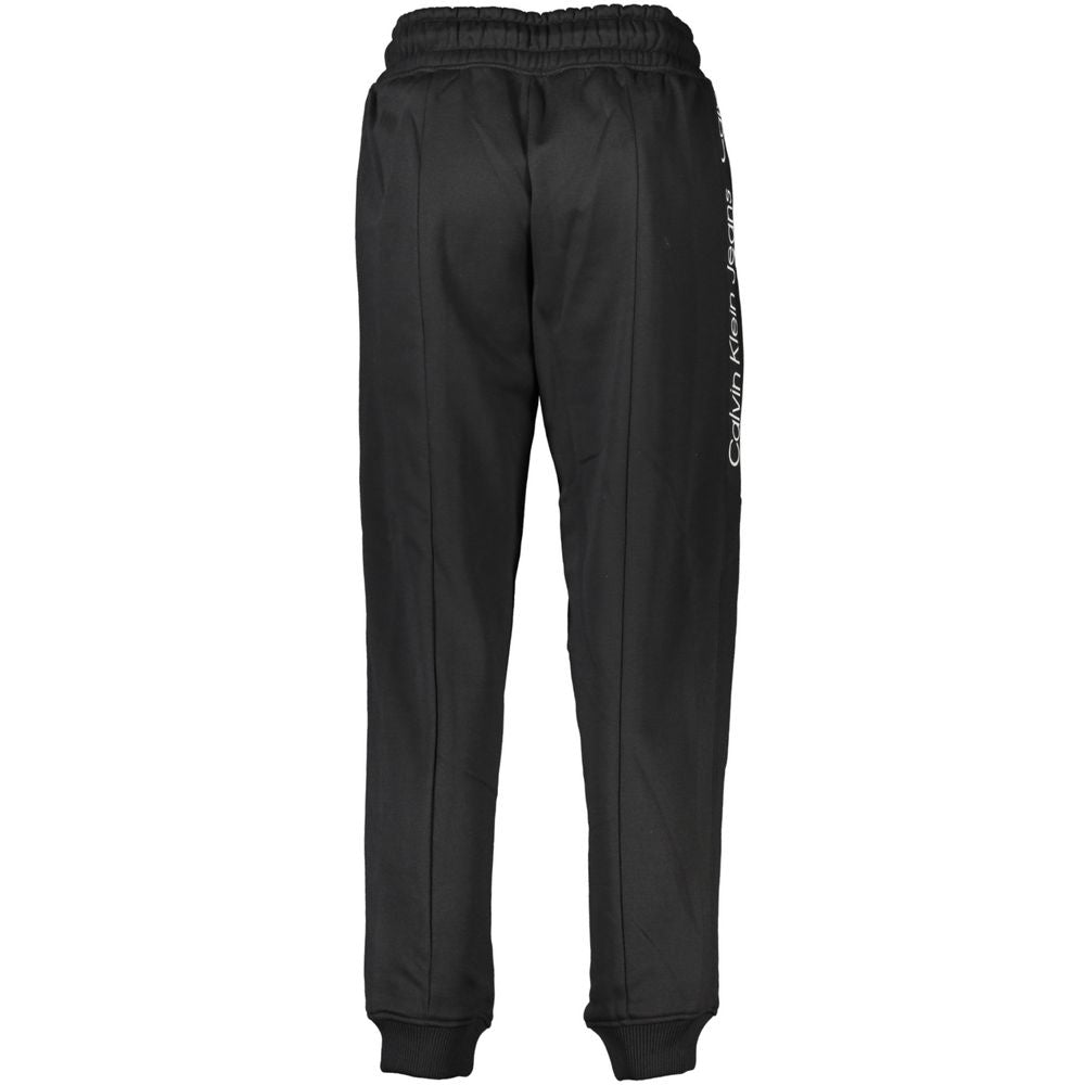 Joggers by Calvin Klein for women in polyester black presents a tailored silhouette, showcasing a tailored and long cut with a refined for a truly tailored aesthetic.