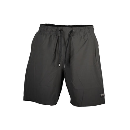 Activewear Shorts by Vans for men in polyester black features a kinetic silhouette, showcasing adjustable-waistband with a kinetic , short, and for a premium athletic look.