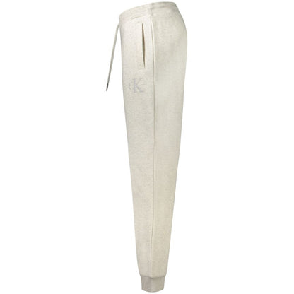 Joggers by Calvin Klein for men in cotton gray features a polished silhouette with a polished , reaching a polished long and finished with a polished .