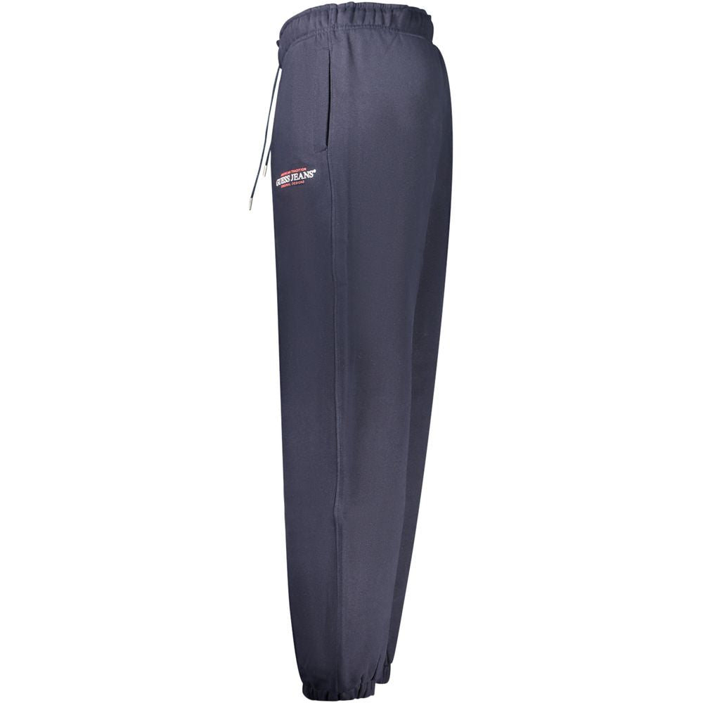 Joggers by Guess Jeans for men in cotton blue & print presents a refined pantology silhouette, artfully defined by a refined pantology athletic, long, and a sophisticated .