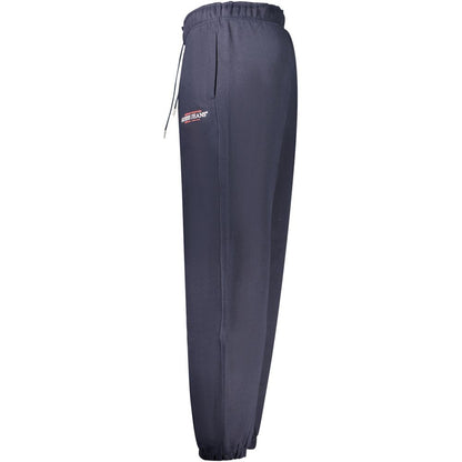 Joggers by Guess Jeans for men in cotton blue & print presents a refined pantology silhouette, artfully defined by a refined pantology athletic, long, and a sophisticated .