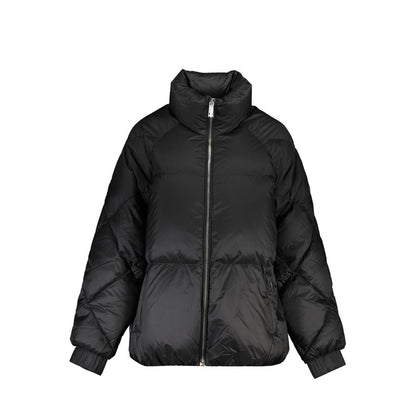 Puffer Jacket by Tommy Hilfiger for women in polyester black features an contemporary silhouette, showcasing a sophisticated and contemporary pockets & insulated for a truly refined look.