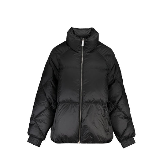 Puffer Jacket by Tommy Hilfiger for women in polyester black features an contemporary silhouette, showcasing a sophisticated and contemporary pockets & insulated for a truly refined look.