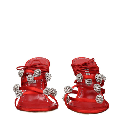 Stiletto Sandals by Manolo Blahnik for women in satin & rhinestone red presents a sculptural silhouette, showcasing the Women's Satin & Rhinestone Stiletto Sandals design with a sculptural stiletto and for a premium look.
