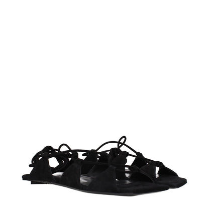Flat Sandals by The Attico for women in suede leather black presents a sculptural silhouette, showcasing the Women's Suede Leather Flat Sandals design with a sculptural flat and for a premium look.