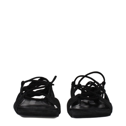 Flat Sandals by The Attico for women in suede leather and black presents a captivating silhouette, showcasing the signature style of the Women's Suede Leather Flat Sandals with a captivating flat and captivating .
