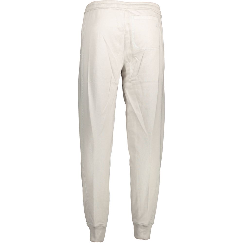 Joggers by Calvin Klein for men in cotton gray & print presents a refined pantology silhouette, artfully defined by a refined pantology athletic, long, and a sophisticated .