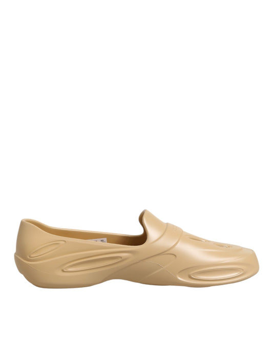 Clogs Sliders Flat Shoes by Dolce & Gabbana for men in thermoplastic polyurethane beige features an statuesque silhouette from the Men's Thermoplastic Polyurethane Clogs Sliders Flat Shoes collection, showcasing a and a statuesque for a statuesque look.