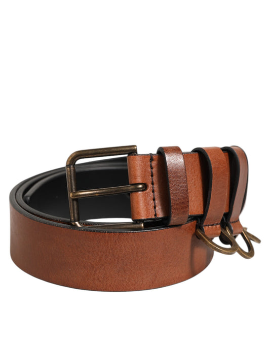 Belt by Dolce & Gabbana for men in calf leather brown & gold presents a artisanal silhouette from the Calf Leather Belt collection, showcasing an artisanal design and refined craftsmanship for a artisanal look.