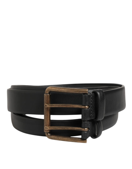 Belt by Dolce & Gabbana for men in brass calfskin leather & metal black & gold features a versatile silhouette, artfully showcasing the versatile design of the Brass Calfskin Leather & Metal Belt for a sophisticated, premium finish.