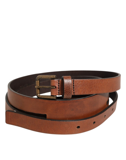 Belt by Dolce & Gabbana for men in calfskin leather brown & gold presents a artisanal silhouette from the Calfskin Leather Belt collection, showcasing an artisanal design and refined craftsmanship for a artisanal look.