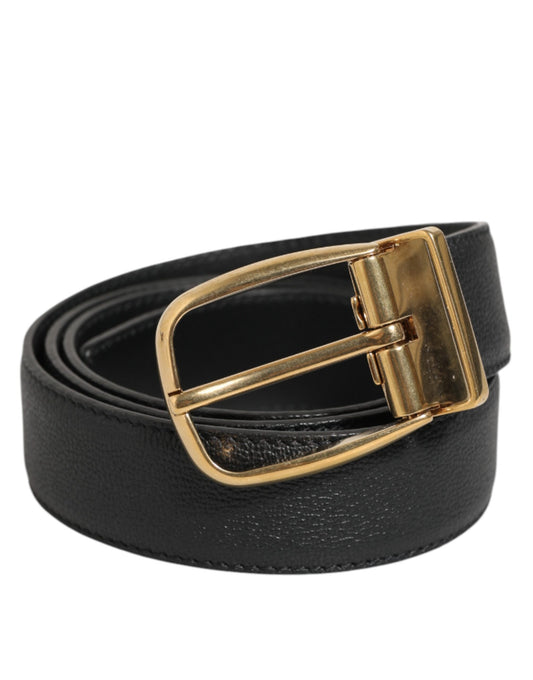 Belt by Dolce & Gabbana for men in calfskin leather black & gold presents a artisanal silhouette from the Calfskin Leather Belt collection, showcasing an artisanal design and refined craftsmanship for a artisanal look.