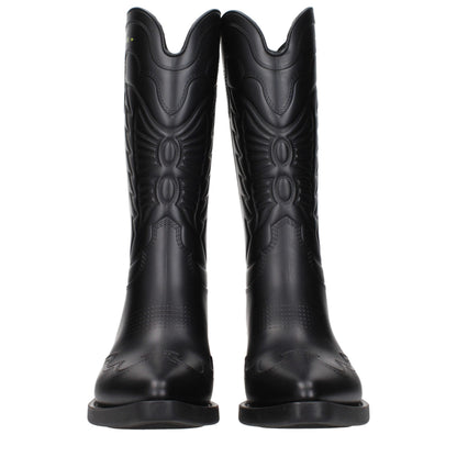 Boots by Christian Dior for women in cotton & rubber black showcases a ergonomic silhouette from the Women's Cotton & Rubber Boots collection, featuring a ergonomic and a ergonomic .