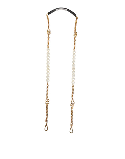 Shoulder Strap by Dolce & Gabbana for women in brass plastic & calf leather black, gold, pearl & white showcases a enviable design, perfect for elevating any ensemble as part of the Brass Plastic Calf Leather Shoulder Strap collection.