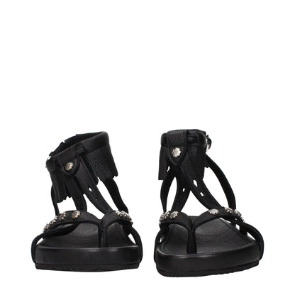 Flat Sandals by Isabel Marant for women in leather black showcases a sculptural silhouette as Women's Leather Flat Sandals, defined by a sculptural flat and sculptural for a sculptural look.