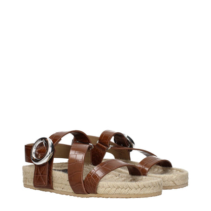 Flat Sandals by Stella McCartney for women in leather brown showcases a sculptural silhouette as Women's Leather Flat Sandals, defined by a sculptural flat and sculptural for a sculptural look.