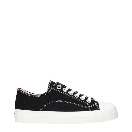 Sneakers by Moschino for women in fabric black presents a impeccable silhouette as Women's Low Top Fabric Sneakers, expertly defined by a impeccable low-top style for a impeccable, high-fashion look.