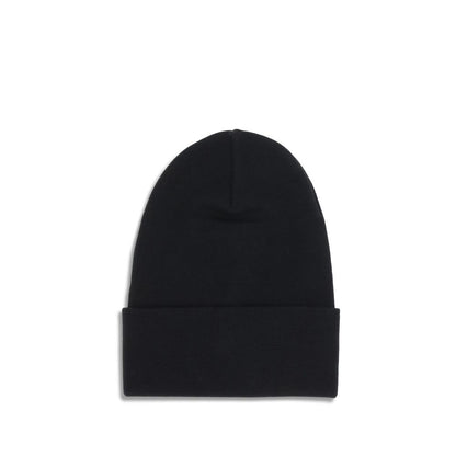 Beanie Hat by Moncler Grenoble for men in wool black presents a sleek silhouette, showcasing the sleek texture and refined craftsmanship of the Wool Beanie Hat collection.