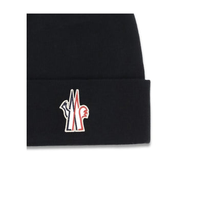Beanie Hat by Moncler Grenoble for men in wool black features a refined luxury silhouette, artfully capturing the essence of the refined luxury Wool Beanie Hat design for a sophisticated, premium look.