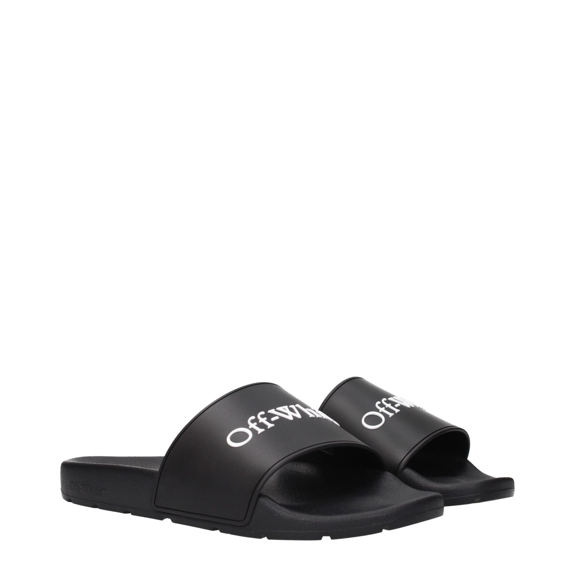 Clogs Slippers by Off-White for men in cotton & rubber black & white features an effortless chic silhouette from the Men's Cotton & Rubber Clogs Slippers collection, showcasing a and effortless chic .