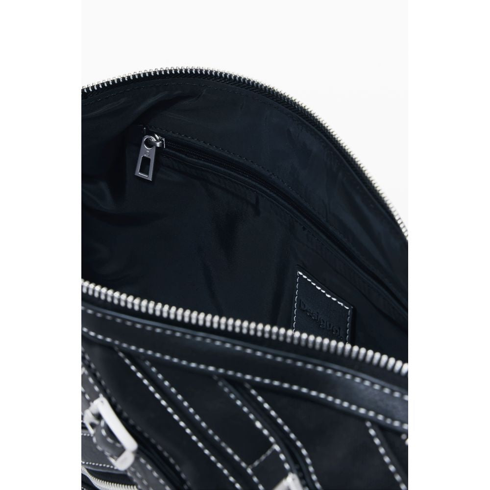 Shoulder Handbag by Desigual for women in polyethylene polyurethane leather black & silver features a ornamental silhouette, showcasing a secure zipper, ample , and ornamental shoulder-strap & adjustable-strap for a sophisticated look.