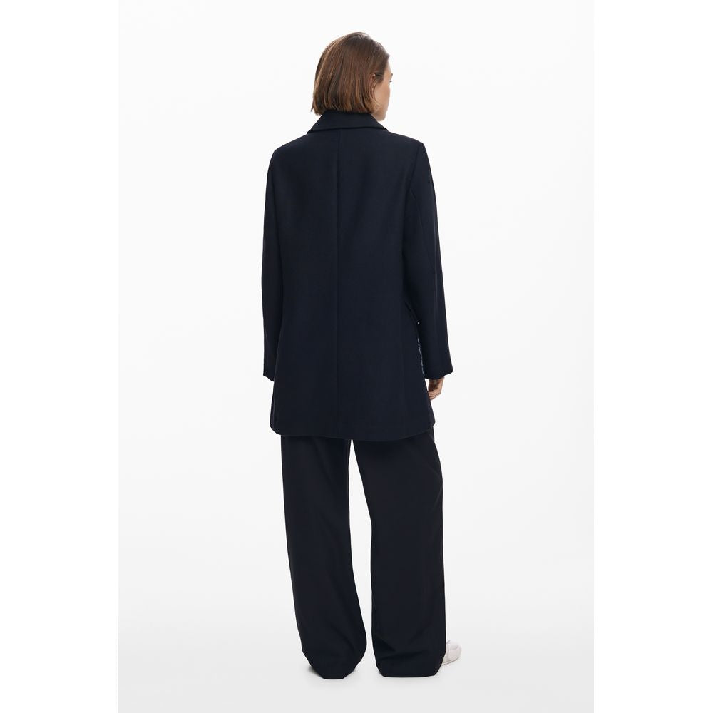 Overcoat by Desigual for women in cotton & marabou black presents a luxurious silhouette, showcasing a luxurious and sophisticated pockets for a premium, luxurious look.