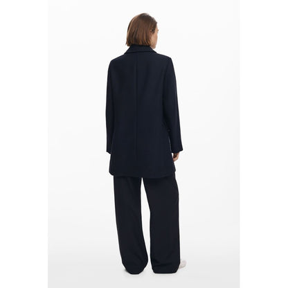 Overcoat by Desigual for women in cotton & marabou black presents a luxurious silhouette, showcasing a luxurious and sophisticated pockets for a premium, luxurious look.