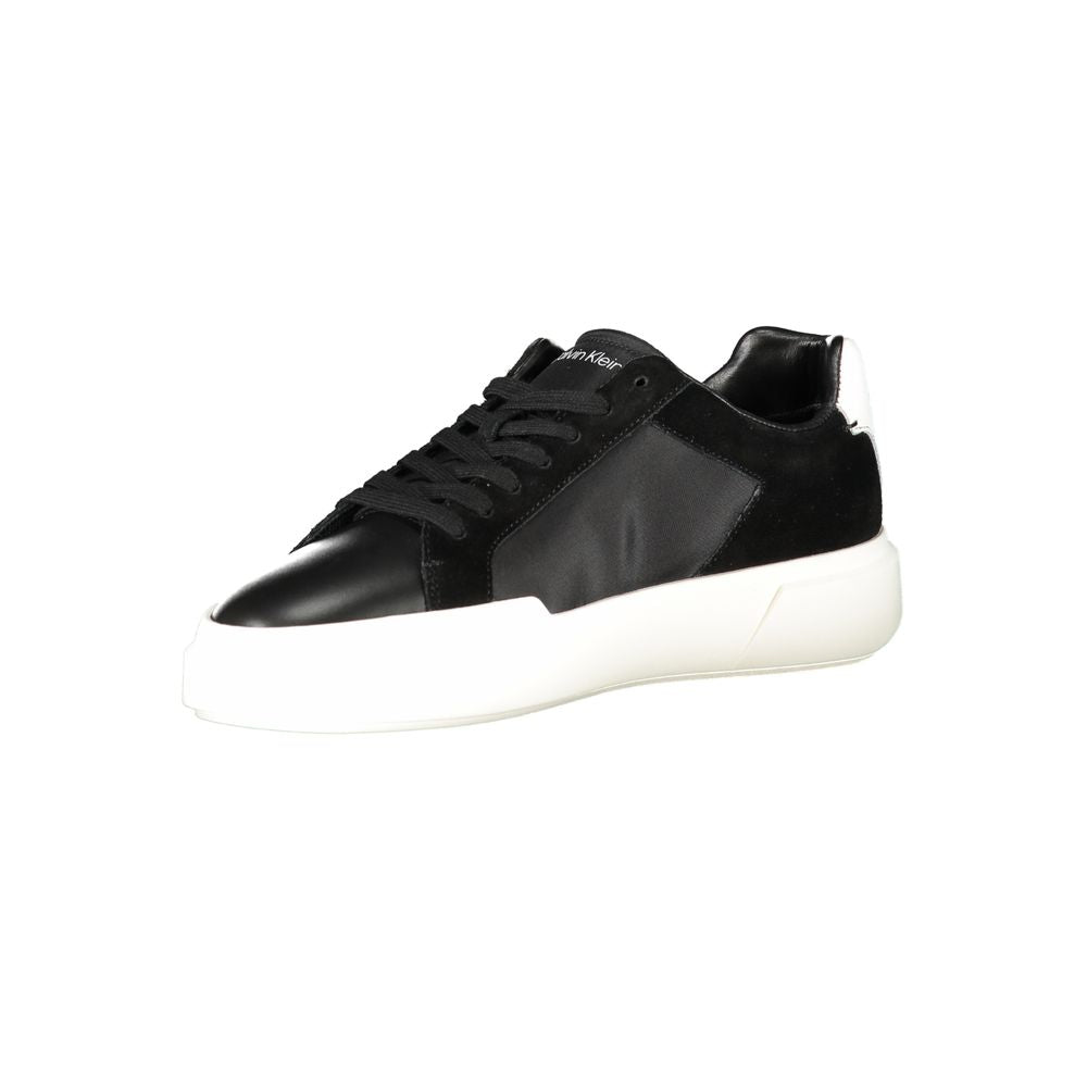 Athletic Sneakers by Calvin Klein for men in polyester polyethylene leather black & white showcases a architectural silhouette, artfully capturing the essence of the Aren Men's Athletic Polyester Polyethylene Leather Sneakers with its signature architectural athletic style construction.