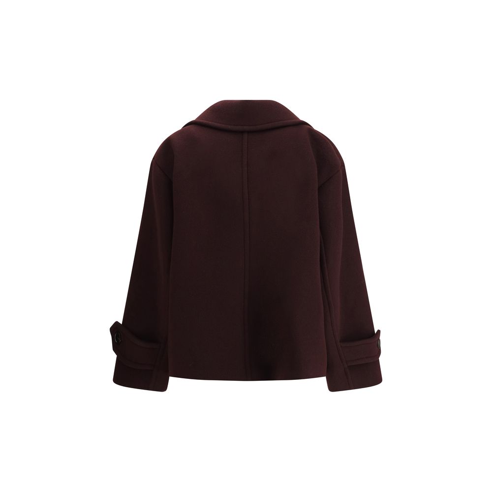 Overcoat by Chloé for women in capra leather & wool horn features a contemporary silhouette showcasing a contemporary and refined pockets for a sophisticated finish.
