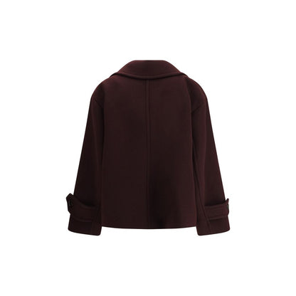 Overcoat by Chloé for women in capra leather & wool horn features a contemporary silhouette showcasing a contemporary and refined pockets for a sophisticated finish.