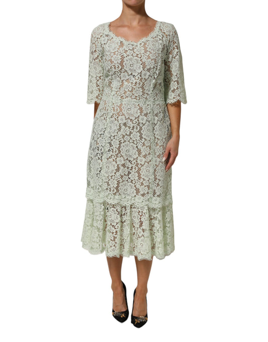Dress by Dolce & Gabbana for women in polyamide silk viscose & cotton mint-green & floral showcases a striking silhouette, elegantly detailed with a short-sleeve, refined , and a striking midi short for a striking finish.