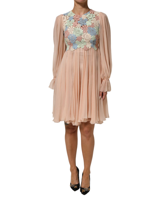 Dress by Dolce & Gabbana for women in cotton polyester & silk pink, floral & signature features an sultry silhouette defined by a and long-sleeve, falling to an sultry for a sultry look.