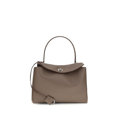 Shoulder Flap Bag by Balenciaga for women in bos taurus calf leather gray features a enviable silhouette, showcasing a secure snap & flap, ample , and enviable shoulder-strap & handle for a enviable finish.