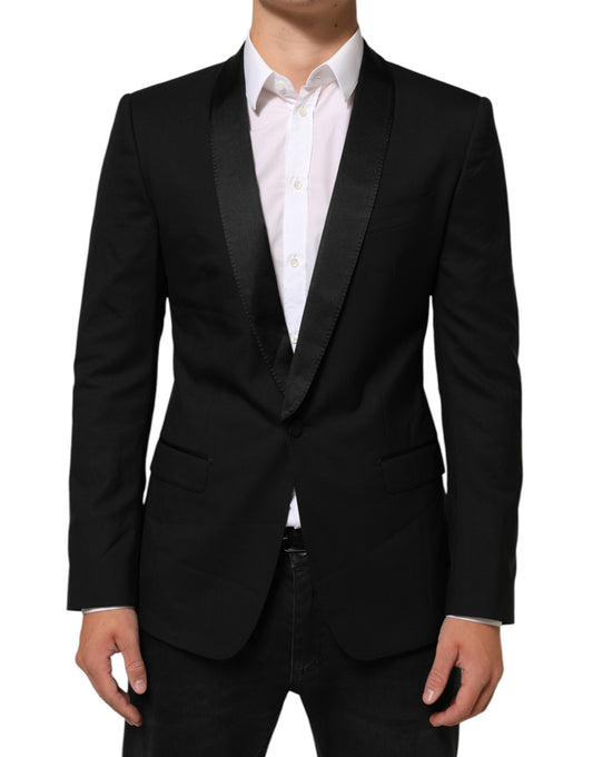 This Blazer by Dolce & Gabbana for men in polyester silk viscose & virgin wool black presents a tailored silhouette, meticulously tailored with a tailored lapel shawl-collar neckline and distinctive for a tailored finish.