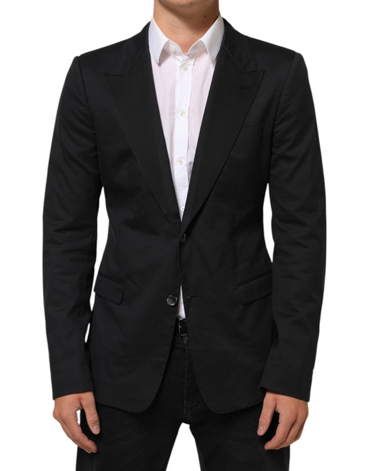 This Blazer by Dolce & Gabbana for men in cotton polyamide viscose & silk black presents a tailored silhouette, meticulously tailored with a tailored and distinctive for a tailored finish.
