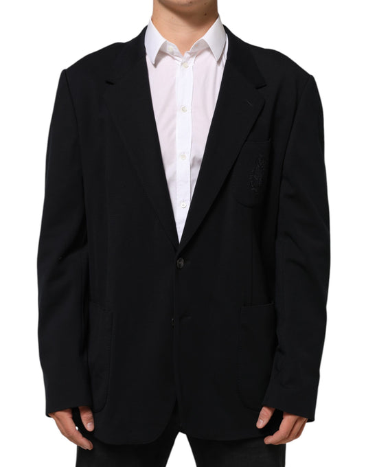 Blazer by Dolce & Gabbana for women in viscose polyester & polyamide black showcases a discerning silhouette, elegantly detailed with a sophisticated and premium for a truly discerning finish.