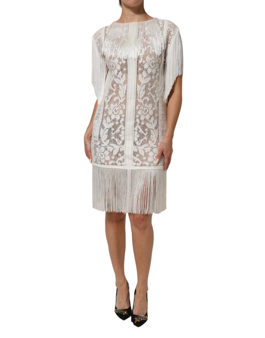 Dress by Dolce & Gabbana for women in polyamide lace cotton & silk white, floral & signature features a dramatic silhouette, showcasing an elegant and short-sleeve that flows into a dramatic knee.