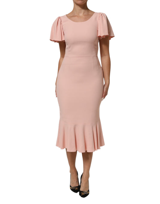 Dress by Dolce & Gabbana for women in silk viscose & acetate pink features an cute silhouette, detailed with a short-sleeve and that elegantly flows into a cute midi short.