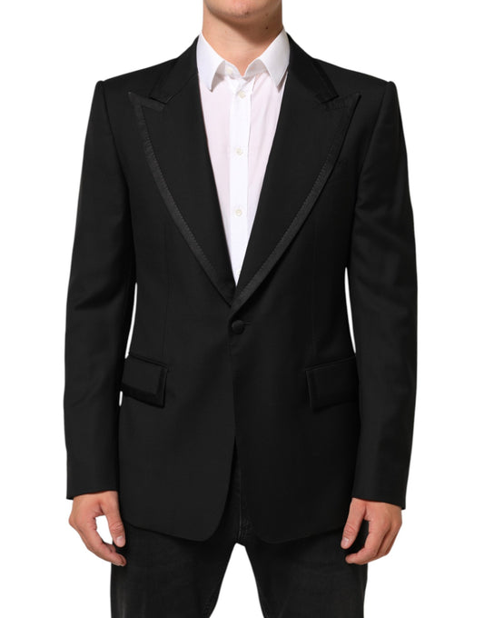 This Blazer by Dolce & Gabbana for men in polyester viscose silk & virgin wool black presents a tailored silhouette, meticulously tailored with a tailored and distinctive for a tailored finish.
