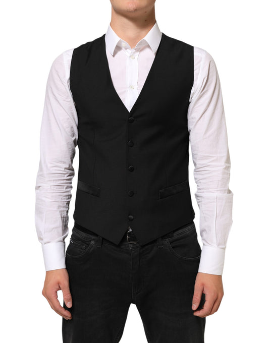 Vest by Dolce & Gabbana for men in virgin wool viscose silk & polyester black showcases a dynamic silhouette, perfectly balancing with a dynamic v-neck neckline for a sophisticated, high-fashion look.