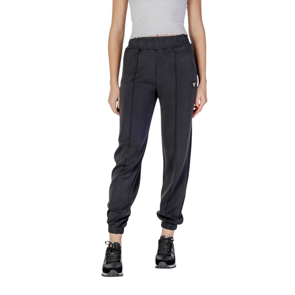Activewear Jogger Pants by Guess Active for women in stretch polyester & modal black features a versatile silhouette, integrating performance with a versatile , long, and comfortable high rise.