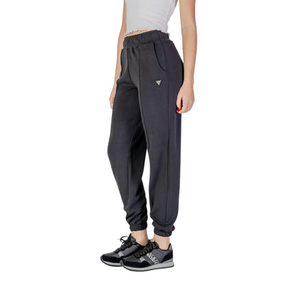 Activewear Jogger Pants by Guess Active for women in stretch polyester & modal black features a contemporary silhouette with , a contemporary , long hem, and high rise for a premium, high-performance aesthetic.
