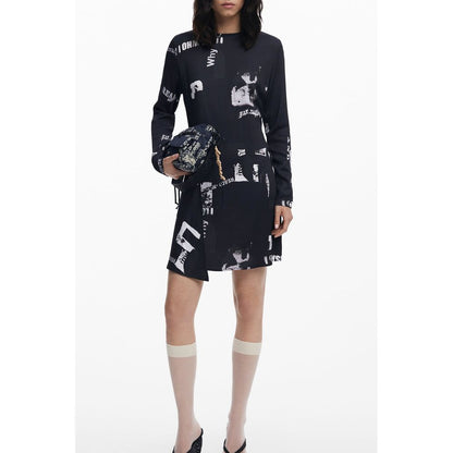Dress by Desigual for women in stretch viscose black & patterned features an eye catching silhouette with a sophisticated , elegant , and a refined short for a eye catching aesthetic.